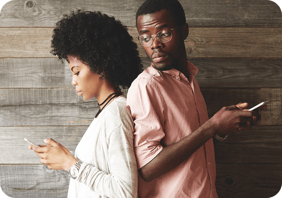 Two people using TripperCash for money transfer